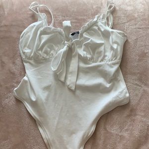 Shein white bodysuit size medium.